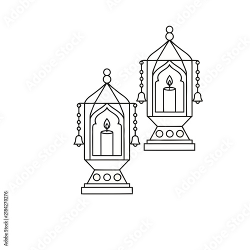 Two Islamic lanterns with candles
