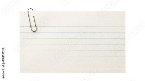 White lined index card with silver metal paperclip for office reminders and organization notes.