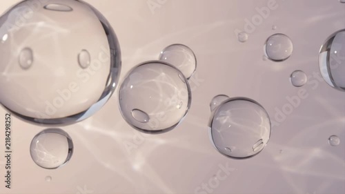 Translucent glass bubbles float through soft light and shifting caustics, creating an elegant abstract 3D background with refraction, depth, and delicate motion.