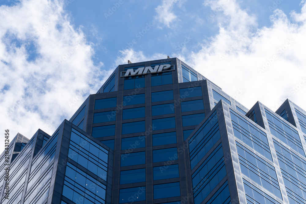 Fototapeta premium Toronto, Ontario, Canada - September 7, 2026: MNP office building on Adelaide Street East in downtown Toronto, Ontario, Canada. MNP is a Canadian professional accountancy and business advisory firm. 