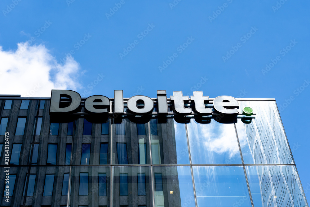 Obraz premium Toronto, Ontario, Canada - September 7, 2026: Closeup of Deloitte sign on the building in Toronto, Ontario, Canada. Deloitte is a British multinational professional services network. 