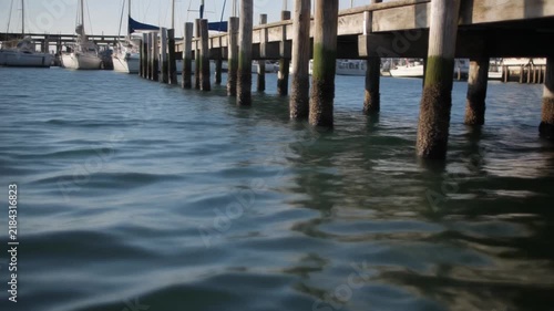 Chaffers marina view with wooden pier posts and yachts