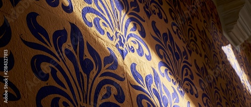 Spanish moorish arabesque tile blue floral pattern close up