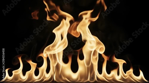 Flame Fireplace Background, Golden Fire Shaped into Symmetrical Dancing Forms, Warm Glowing Heat, Abstract Dramatic Light and Curling Motion for Cozy Interior Design Concept