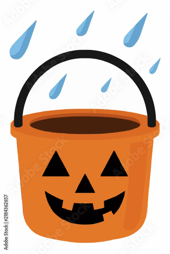 Orange jack o lantern candy bucket with handle under falling rain drops, flat vector illustration on a white background