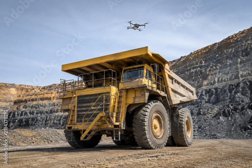 Drone Inspecting Giant Open Pit Mining Truck