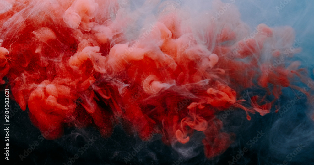 Obraz premium Paint vapor. Dye mist. Blur red blue color fume splash explosion smoke water droplets floating texture on abstract acrylic dark black art background.