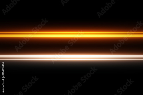 Two glowing light streaks in orange and white against a dark background.