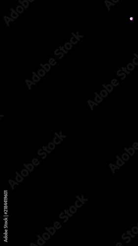 Colorful Glowing Capsule Lights Moving on Black Background