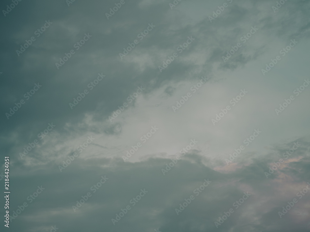 Fototapeta premium Minimalist Grey-Teal Storm Clouds Filling Expansive Moody Sky