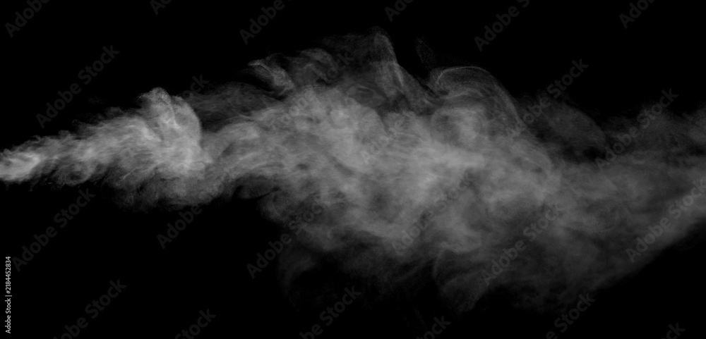 Obraz premium Gray smoke and dust cloud isolated on a black background, forming a soft atmospheric plume with swirling texture, flowing motion, and dramatic depth for cinematic effects and creative designs.