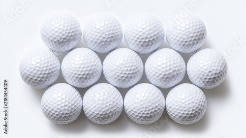 golf. White golf balls in perfect formation, emphasizing precision and simplicity on white background. event key visuals, club posters, designed for fitness apps and gym onboarding.