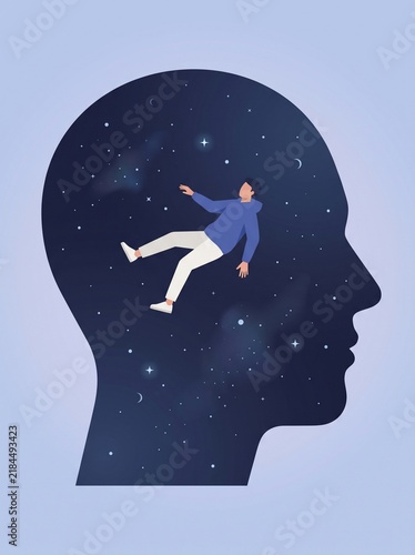 Man floating inside human silhouette filled with cosmic stars