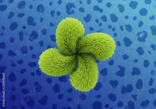 Fluffy green four-leaf clover shape on a blue spotted background