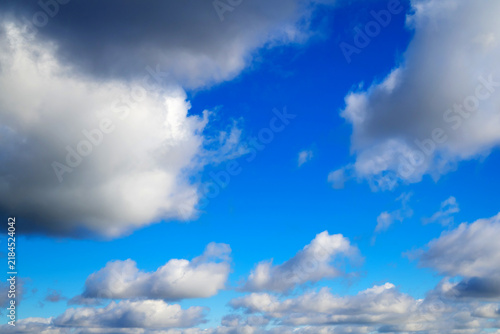 Obraz na płótnie small cumulus clouds against an open blue sky