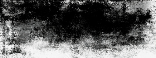Grungy textured background with dark abstract shapes and distressed white edges for graphic design elements
