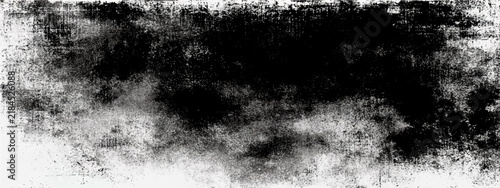 Dark abstract ink splatters and textures on white paper with grunge effect for distressed backgrounds