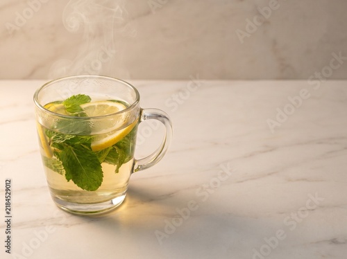 Hot Healthy Herbal Tea Served In A Clear Transparent Glass Cup