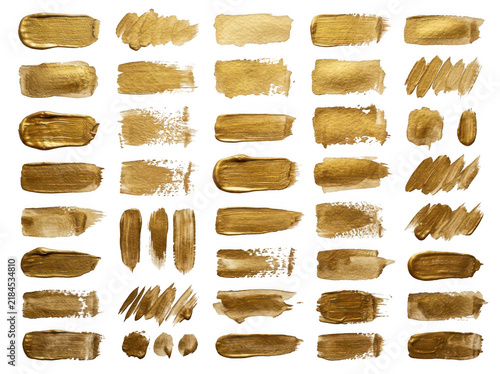 Large collection of various gold paint brush strokes isolated on transparent background for premium graphic design assets