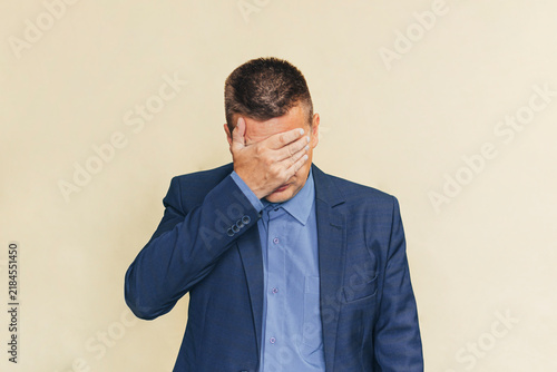 Принти на полотні close up employee hand gesture palm up over face and head for stress , major of depressive disorder concept