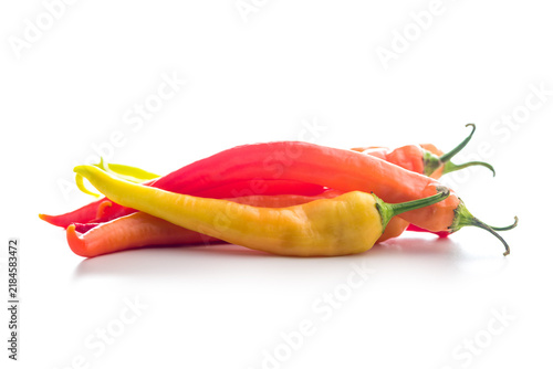 Colorful Red And Yellow Chili Peppers On White Background For Spicy Food And Cooking