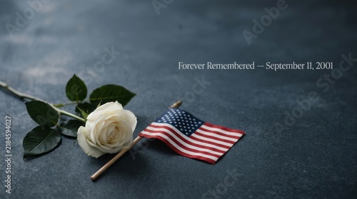 Heartfelt tribute honoring september 11 2001 featuring white rose alongside an american flag in remembrance