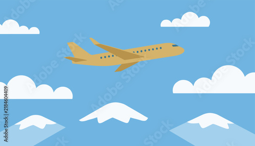 Large gold airplane flying gracefully through blue sky above snowy mountain peaks with fluffy white clouds.