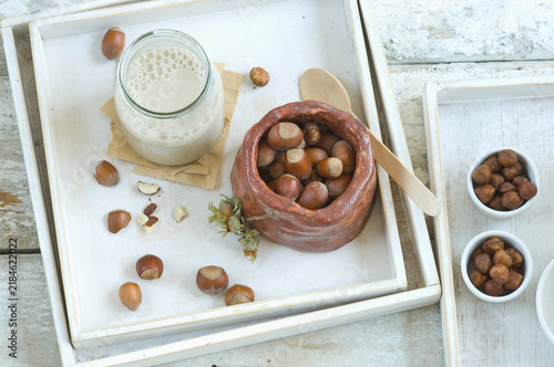 Glass bottle of homemade hazelnut milk