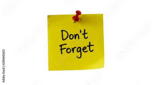 фотографія Yellow sticky note with dont forget message and red push pin isolated on transpa