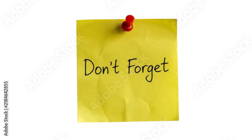 Bild auf Leinwand Yellow sticky note with the handwritten text don't forget and a red pin isolated