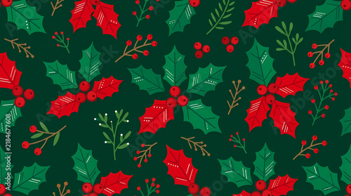 Seamless pattern of festive holly leaves and berries on a dark green background