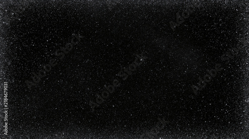 Fotografie Dark abstract background with fine white dust texture