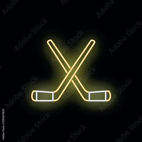 Crossed hockey sticks glowing with yellow neon light representing sport and game
