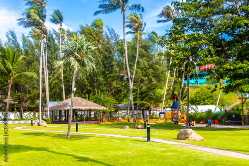 Luxury Marriott Phuket kids playground tropical palms Merlin Beach Thailand.