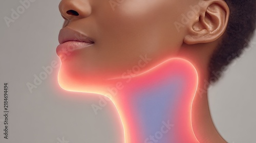 This partial close-up shot shows the side profile of a person's lower face and neck. The throat area is marked with glowing red and blue highlights