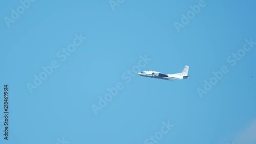Russian Plane military plane in flight at high speed in the blue sky