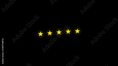 Five glowing yellow stars rotating and shimmering on a black background stock footage