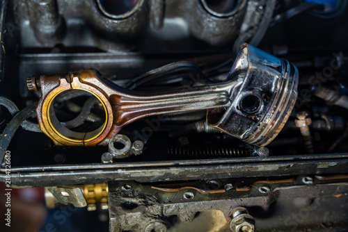 Fotografía Piston and connecting rod removed from disassembled car engine