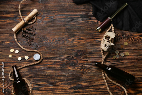 Canvastavla Frame made of pirates items on wooden background