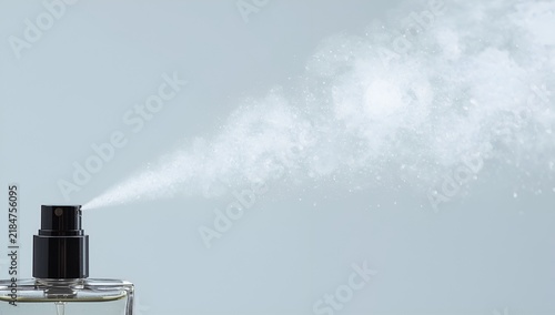 Spray From Perfume Bottle in Air