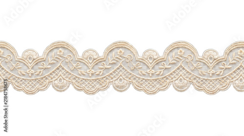 Konstfotografi Delicate beige lace trim with floral motif during studio lighting isolated on tr