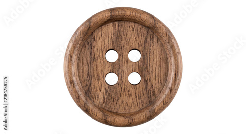 Fotografie Natural wooden button with four holes, showcasing wood grain texture and rustic