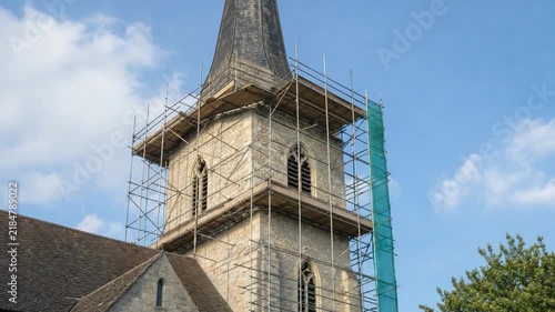 Renovation of a church bell tower. With scaffolding.