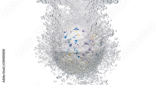 Obraz na płótnie Colorful bath bomb dissolving in water creating many bubbles