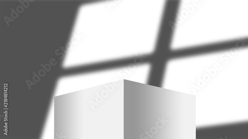 Obraz na płótnie Isolated white cubic pedestal display with window shadow overlay