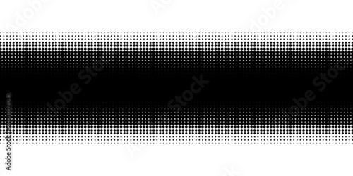 Halftone gradient rectangle with dot pattern fading from center. Black and white dotted texture creates smooth transition effect for modern graphic design backgrounds.