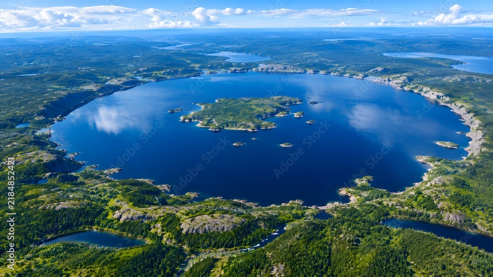 Fototapeta premium Aerial View of Manicouagan Reservoir Circular Impact Crater Lake Known as the Eye of Quebec