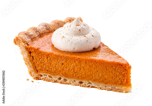 Pumpkin pie slice with whipped cream and spices isolated on transparent background