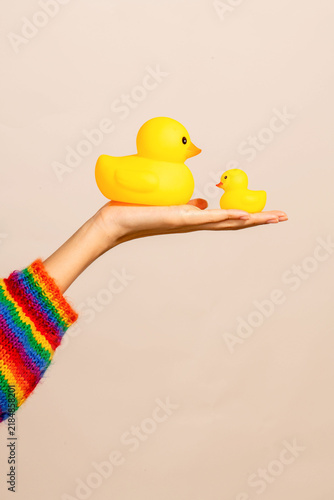 Foto Colorful playful rubber duckies displayed