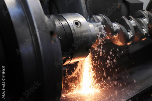 Grinding of the crankshaft on a grinding machine.